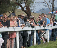 Crowds at fence - courtesy of Peter Young